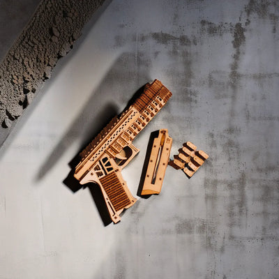 Lumigic Desert Eagle pistol wooden 3D puzzle model, detailed assembled wooden gun with realistic design and intricate craftsmanship.