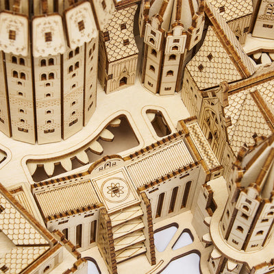 Lumigic Magic School Music Box wooden 3D puzzle model with intricate school building design and movable parts.