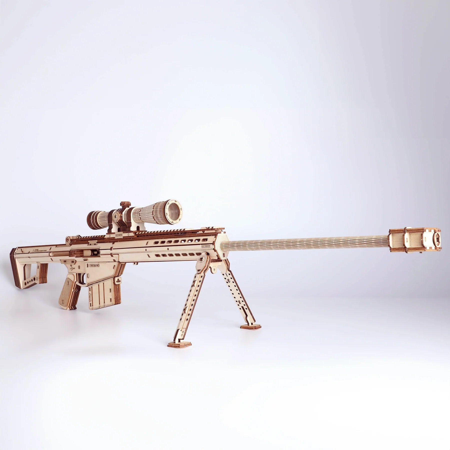 Wooden Barrett M82A1 sniper rifle toy model kit by Lumigic, assembled 3D puzzle featuring detailed parts and realistic design.