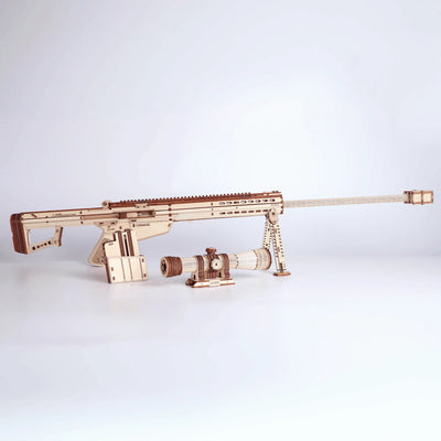 Wooden Barrett M82A1 sniper rifle toy model kit by Lumigic, assembled 3D puzzle featuring detailed parts and realistic design.