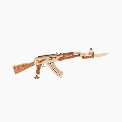 Wooden model of an AK47 assault rifle gun toy from Lumigic, assembled as a detailed 3D puzzle display.