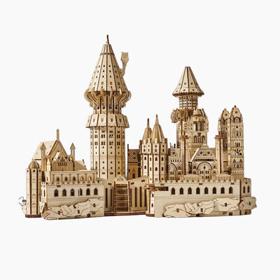 Wooden 3D puzzle of a Magic School music box by Lumigic, showcasing intricate craftsmanship and detailed design.