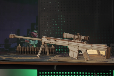 Wooden Lumigic Barrett M82A1 sniper rifle 3D puzzle model kit, detailed toy gun with intricate craftsmanship and realistic design.
